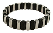 Silver and Black Gibraltar 300s, 6mm x12 mm in size, attached to each other magnetically (on the sides), to form a bracelet.